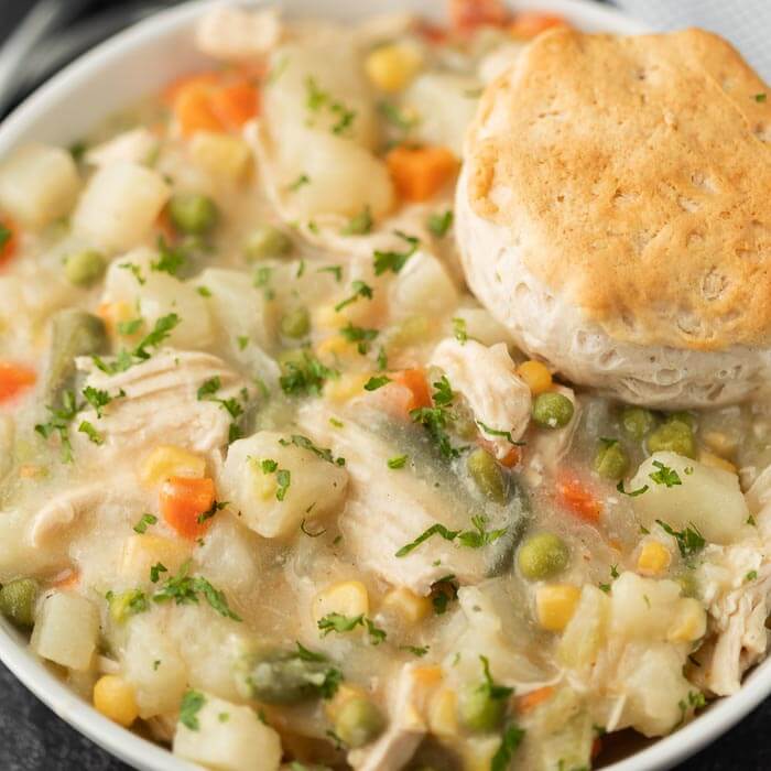 Close up image of chicken pot pie in a bowl