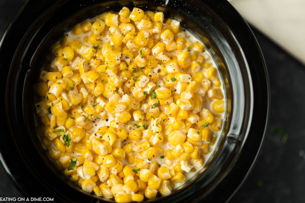 Close up image of creamed corn in the crock pot. 