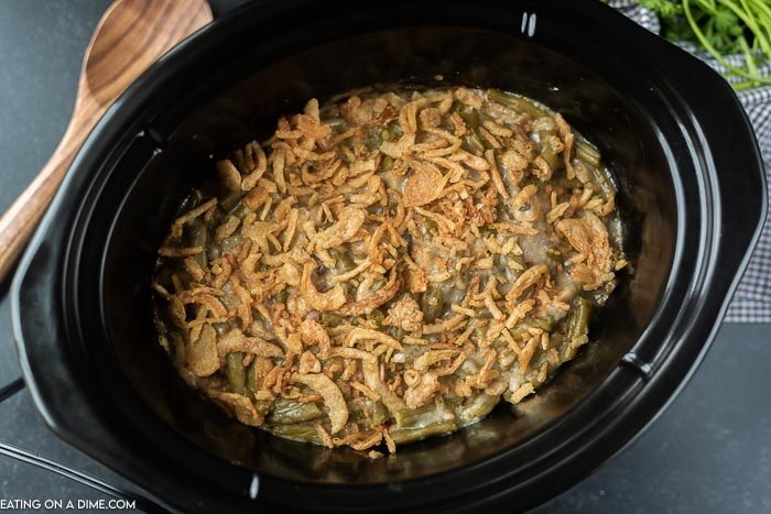 Overview of green bean casserole in the crock pot. 