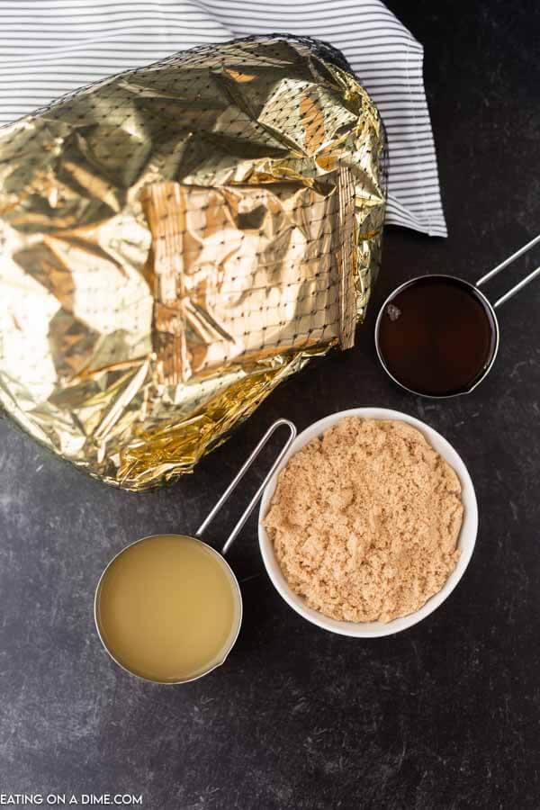 Crock pot Ham Recipe is easy to make. Slow cooker ham is perfect for the holidays and frees up your oven. Try this crockpot spiral ham today! ingredients for recipe: ham, brown sugar, pineapple juice, honey