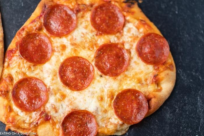 Close up photo of pepperoni flatbread pizza.