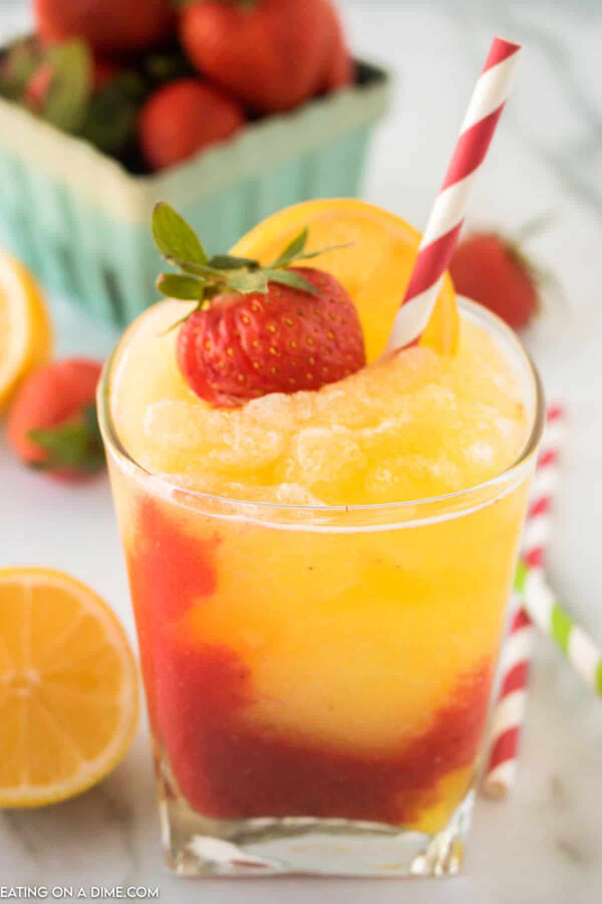 Closeup picture of frozen strawberry lemonade in glass. 