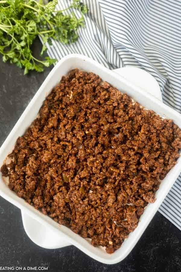 baking dish topped with ground beef