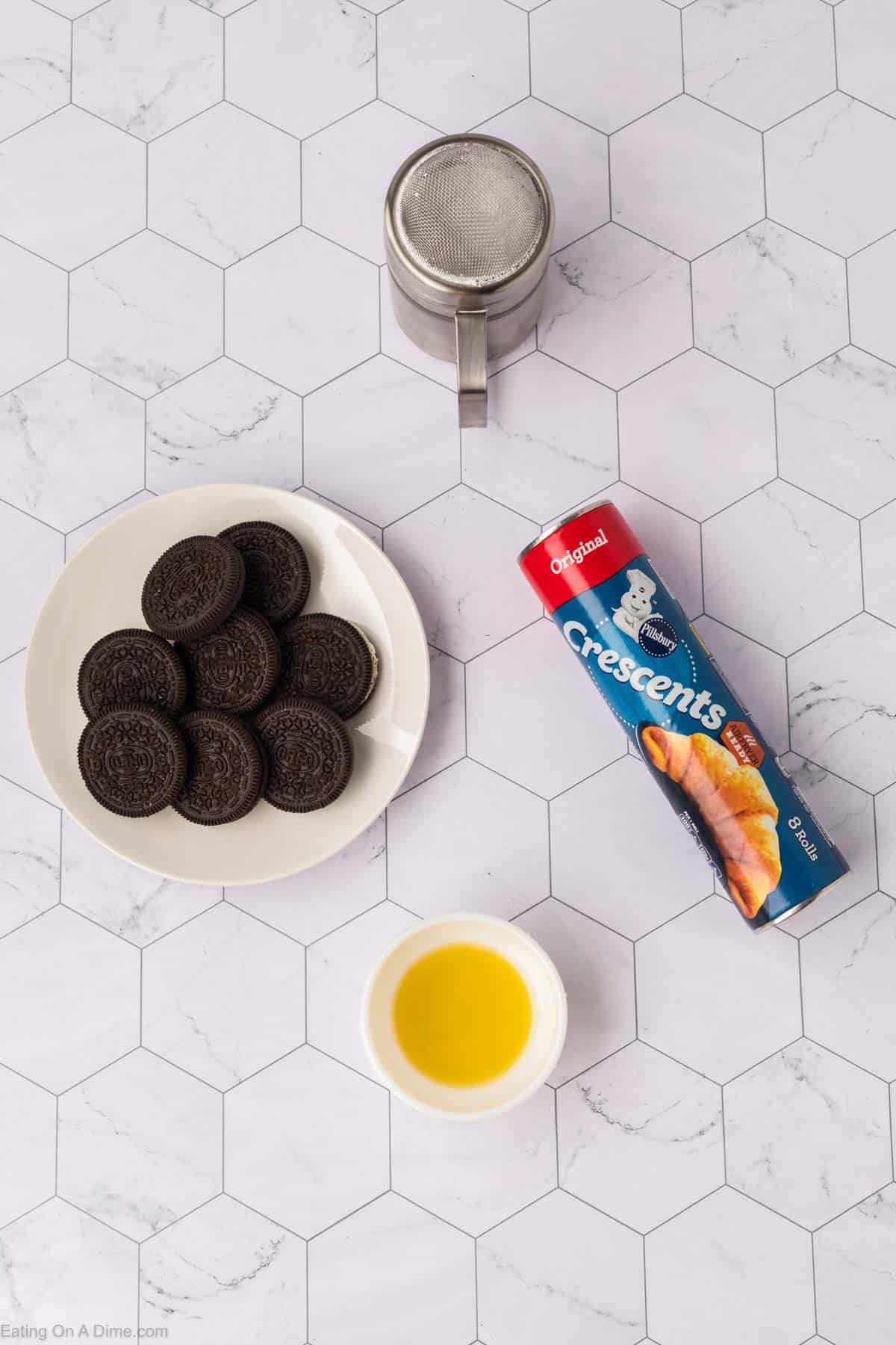 Plate of Oreos, Crescent Rolls, Oil and Powdered sugar