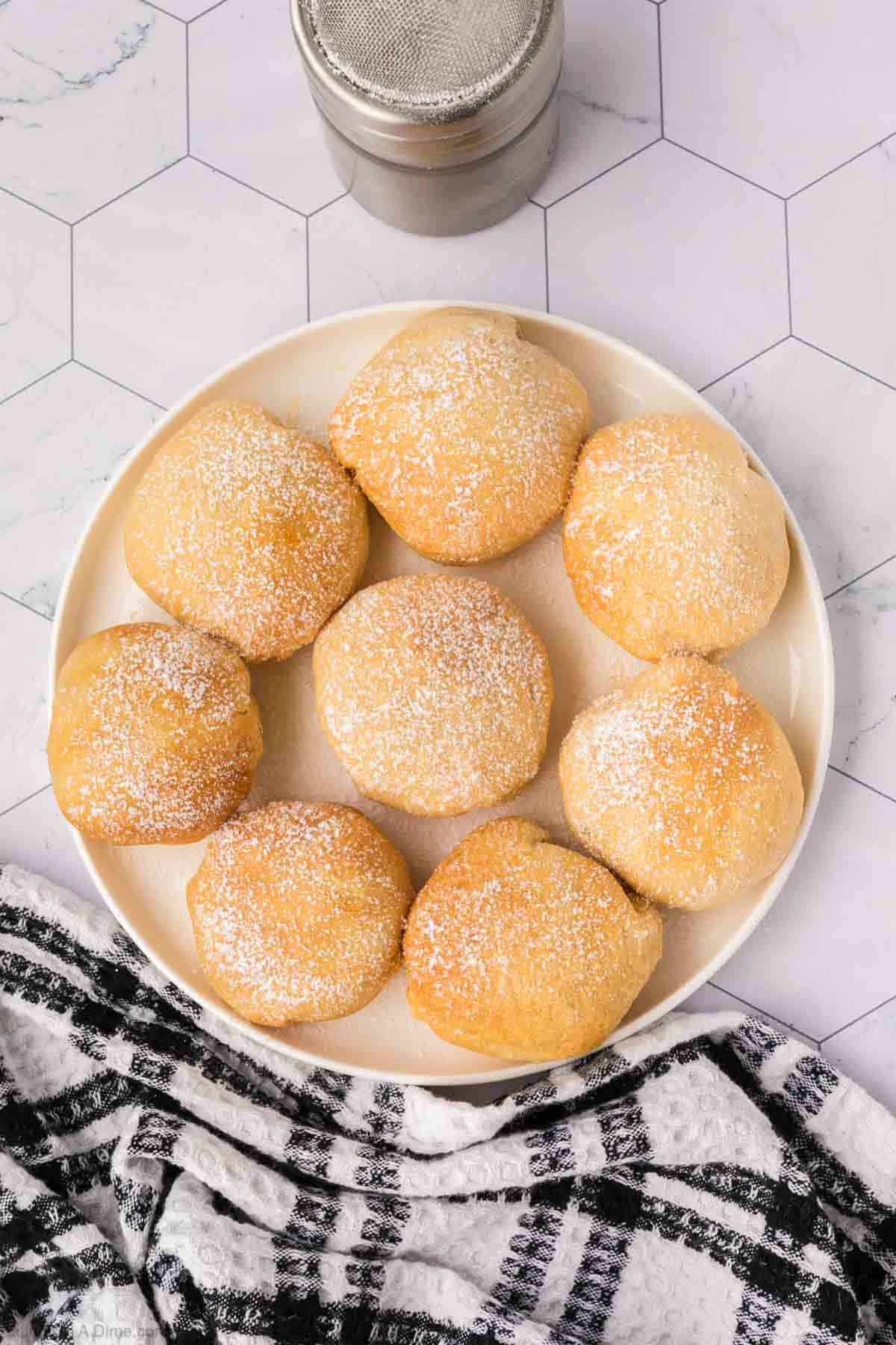 Air Fried Oreos topped with powdered sugar on a plate