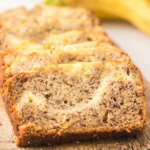 Sliced Cream Cheese Banana Bread Recipe with a creamy swirl.