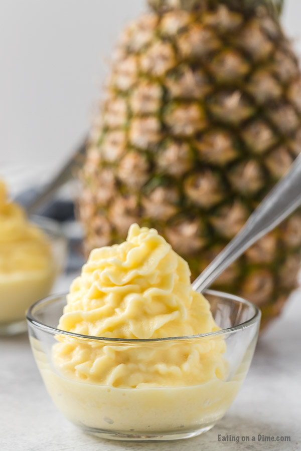 close up image of dole whip in a clear bowl 