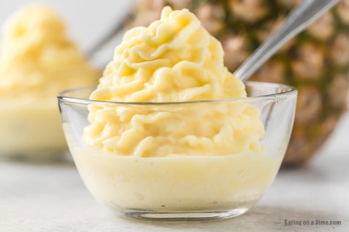 close up image of dole whip in a clear bowl 