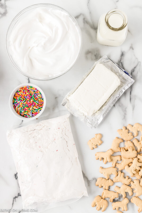 Ingredients needed - funfetti cake mix, cream cheese, cool whip, milk, and sprinkles. 