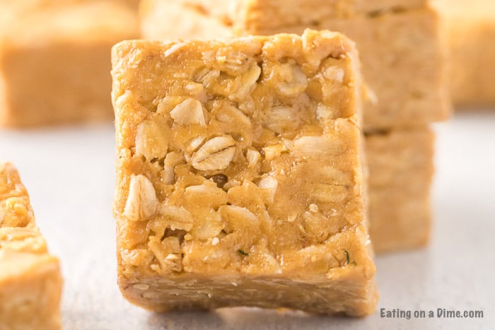 Close up image of a serving size of peanut butter oat bars. 