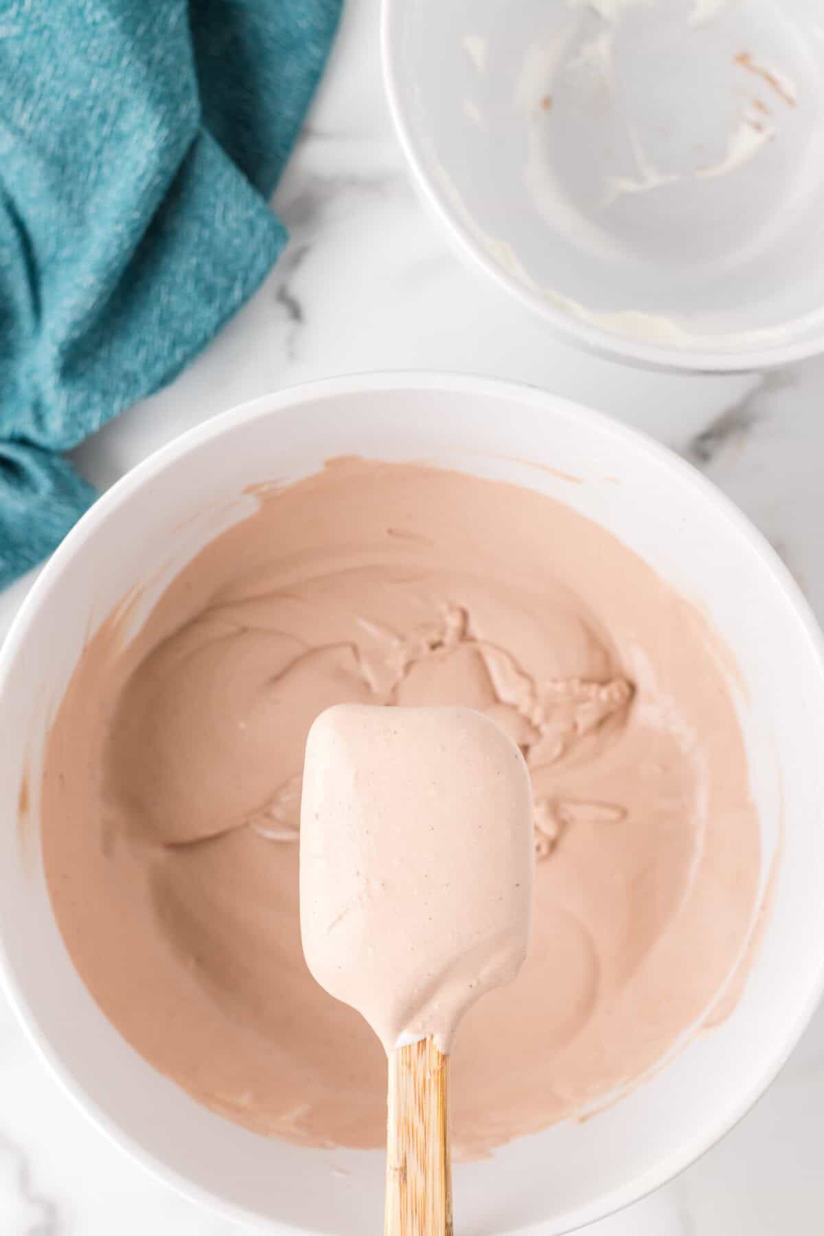 Mixture combined together in a bowl with a spatula.