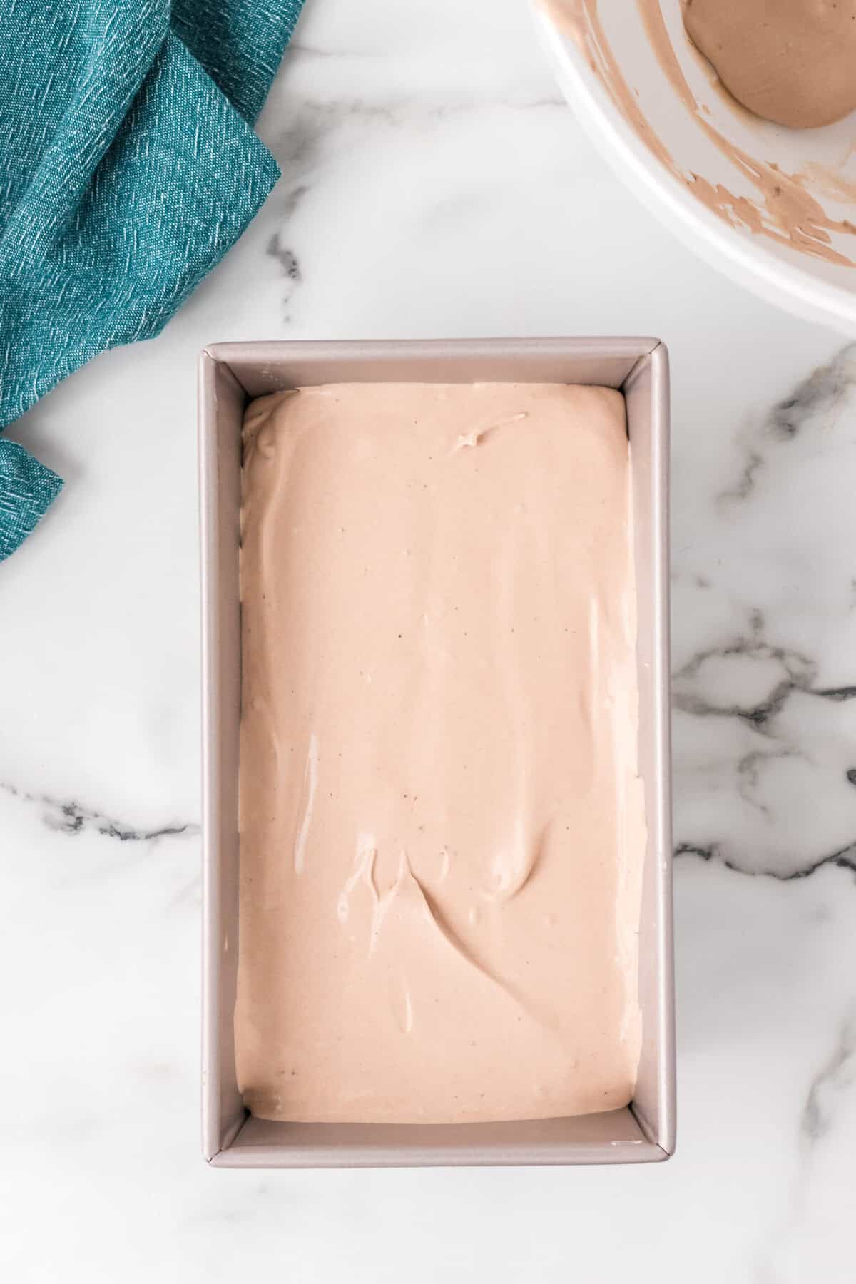Chocolate mixture in a loaf pan.