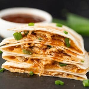 BBQ Chicken Quesadillas stacked together.