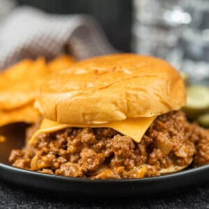 Close up of sloppy joes served on a bun.