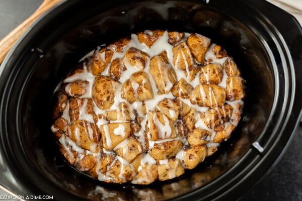 Close up image of crock pot cinnamon roll casserole. 