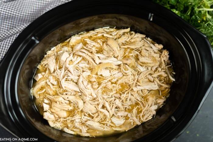 Close up image of Mississippi Chicken in a crock pot. 