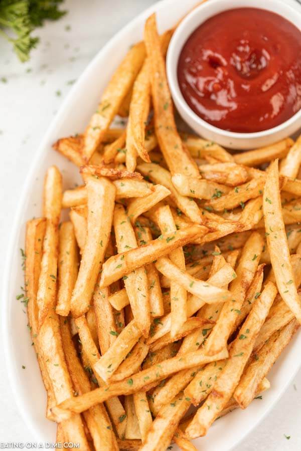 plate of french fries with ketchup 