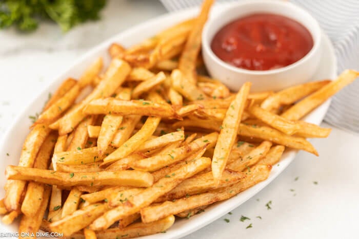 plate of french fries with ketchup