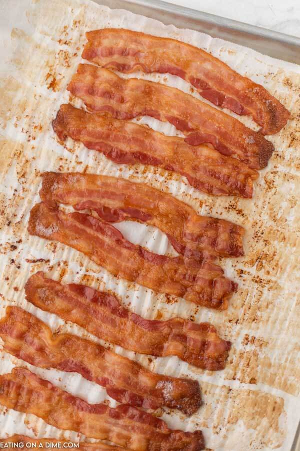 bacon slices on baking sheet