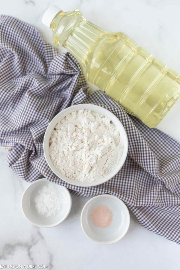 Ingredients for recipe: flour, salt, baking powder, water, oil. 