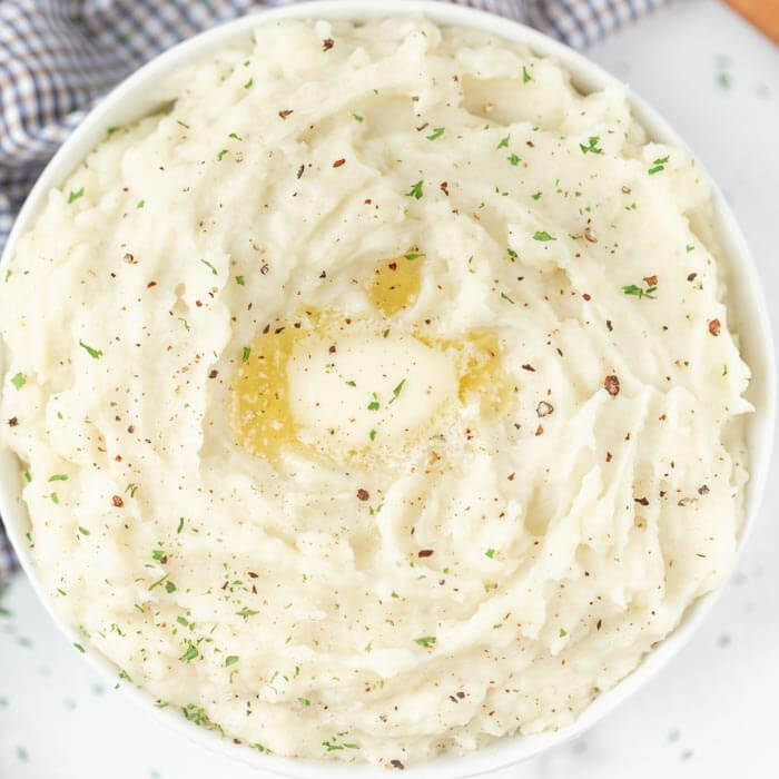 bowl of mashed potatoes with butter 