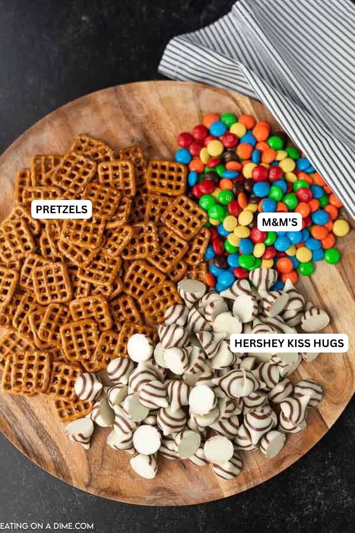 Ingredients for recipe: M&M's, pretzels and Hershey Kiss Hugs.