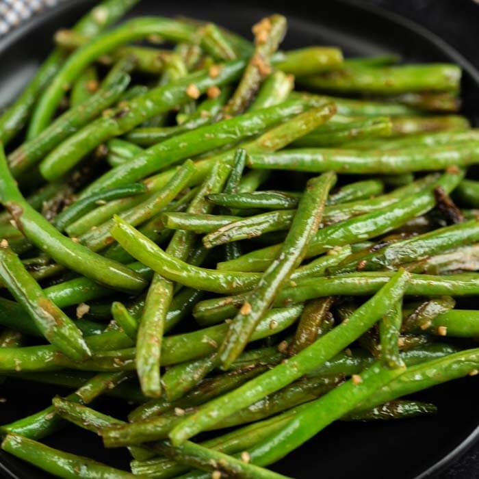 Serving platter of green beans. 