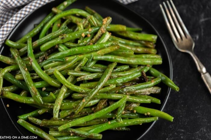 Serving platter of green beans. 