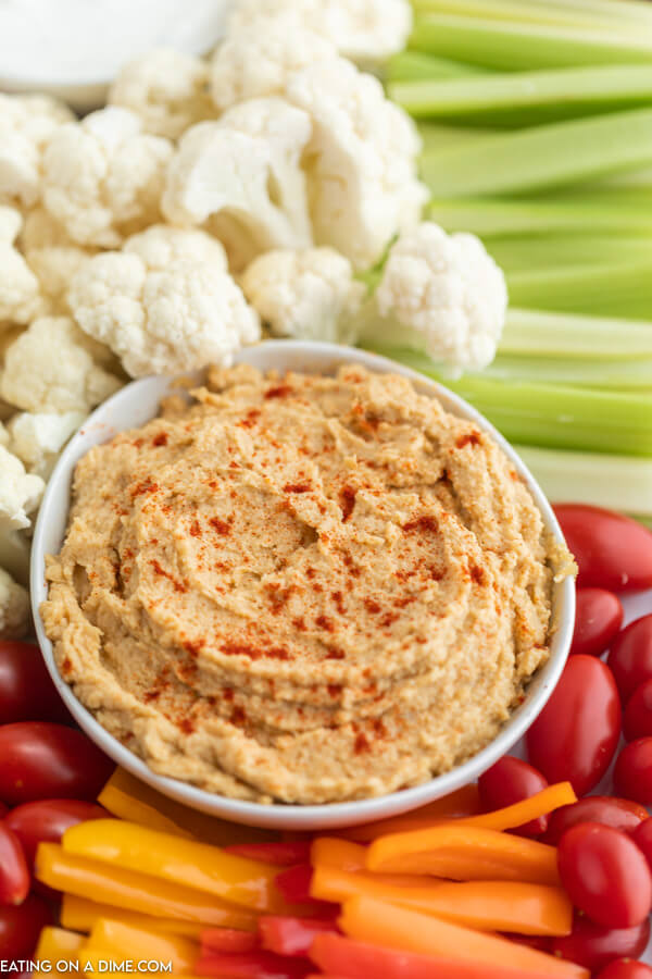 bowl of hummus with vegetables