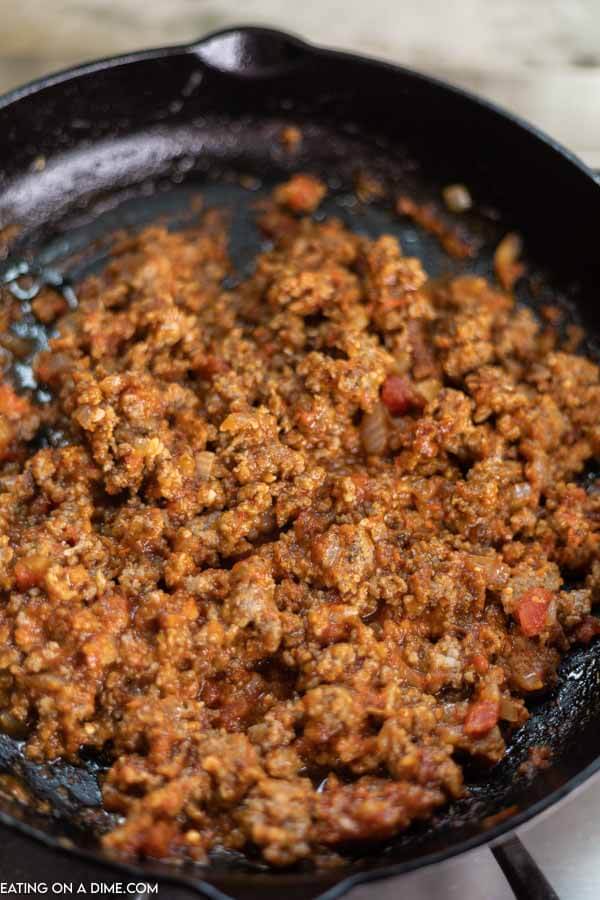 Browned ground Italian Sausage in skillet. 