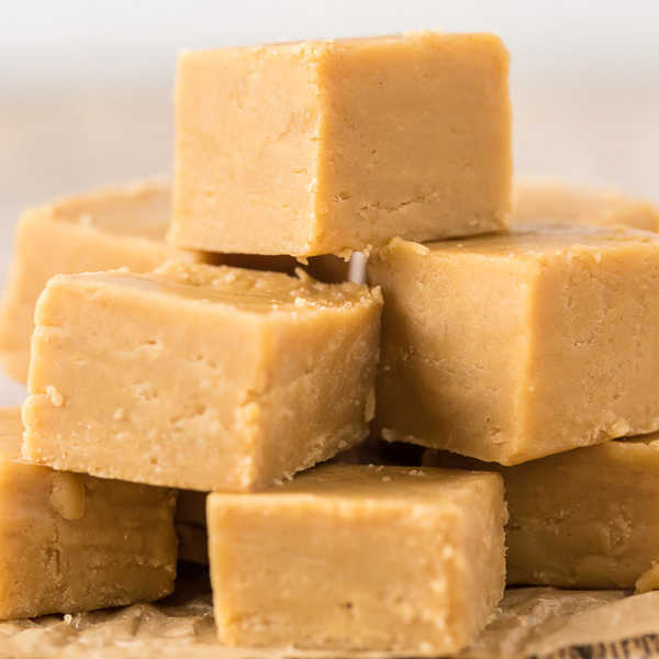 Close up image of peanut butter fudge stacked. 