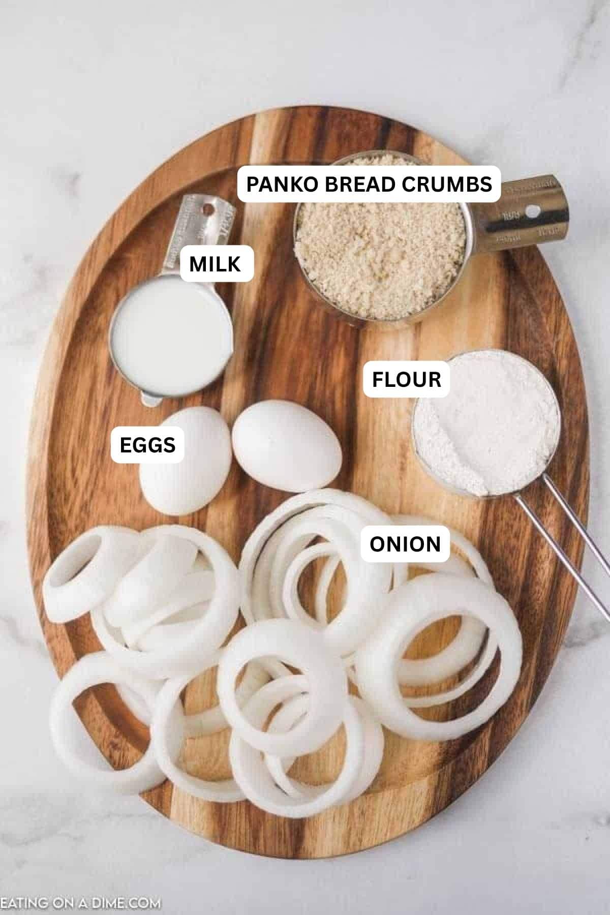 Ingredients for recipe - panko bread crumbs, milk, flour, eggs, onion.