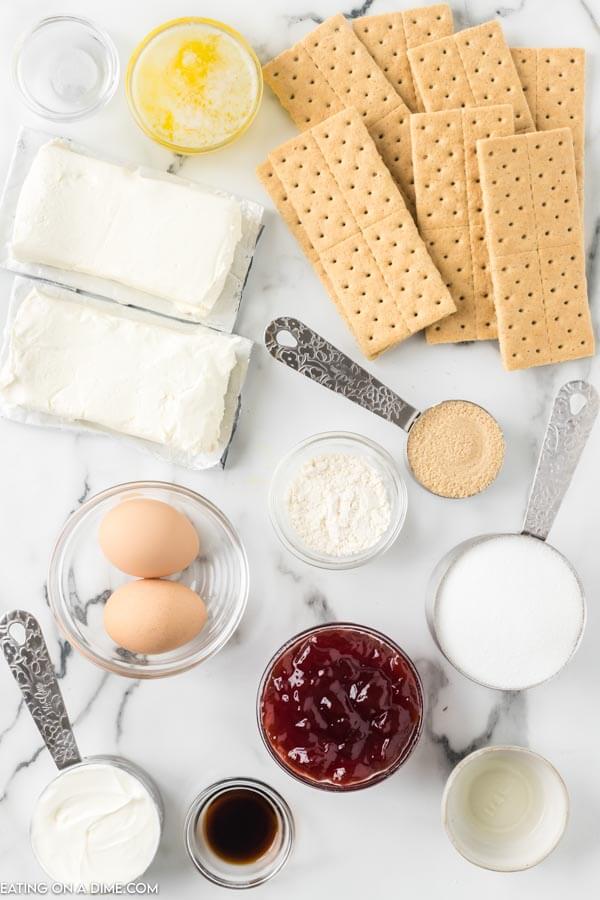 Ingredients for recipe: graham crackers, eggs, jelly, milk, sugar, vanilla, cream cheese. 