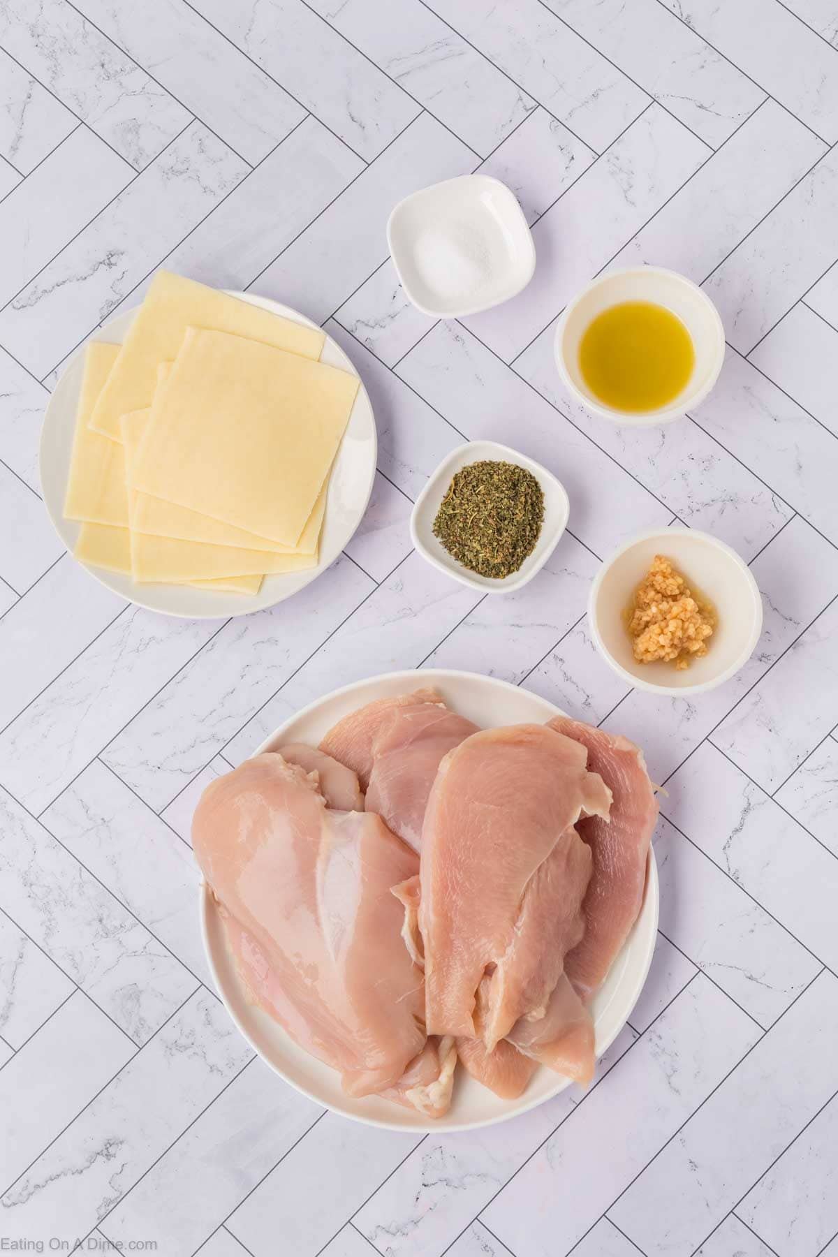 Ingredients - chicken, minced garlic, olive oil, Italian Seasoning, Mozzarella Cheese Slices and salt