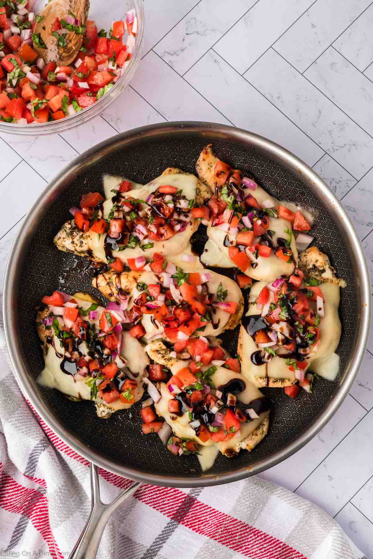 Chicken bruschetta in a skillet