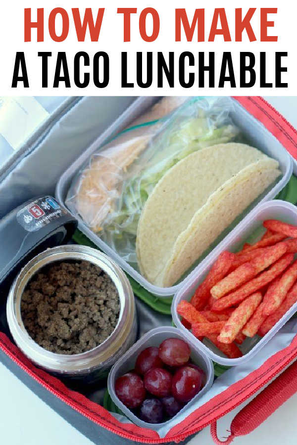 A homemade taco lunchable in a lunch box with the words 