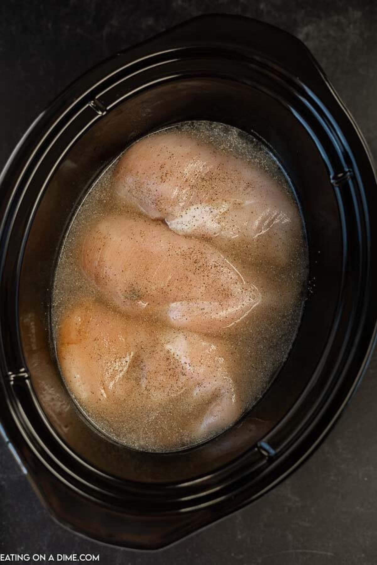 chicken and broth in crock pot