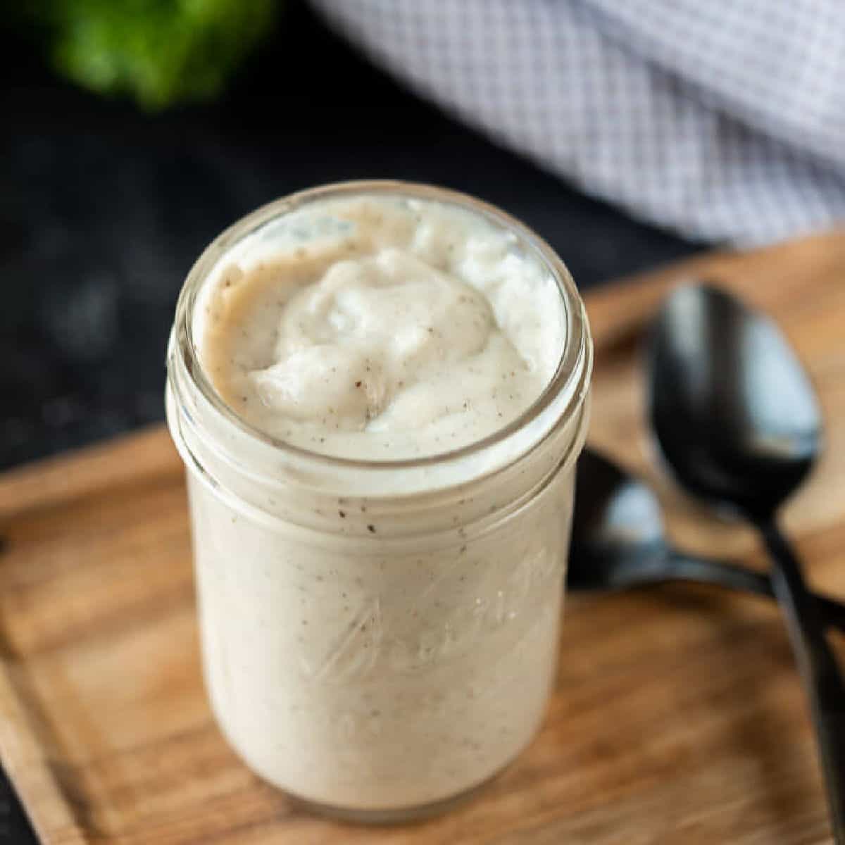 A jar of homemade cream of chicken soup.