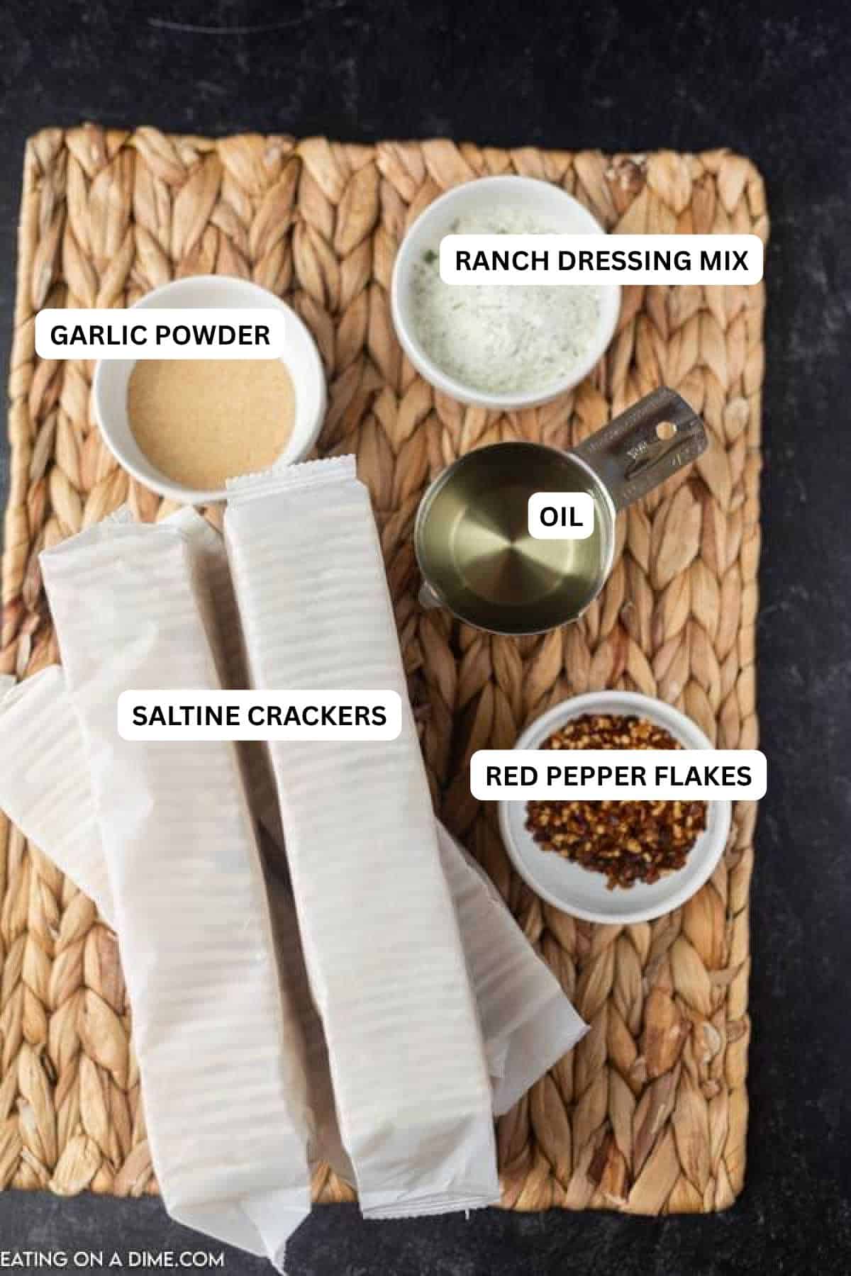 Ingredients for recipe: red pepper flakes, saltine crackers, oil, garlic powder and ranch.