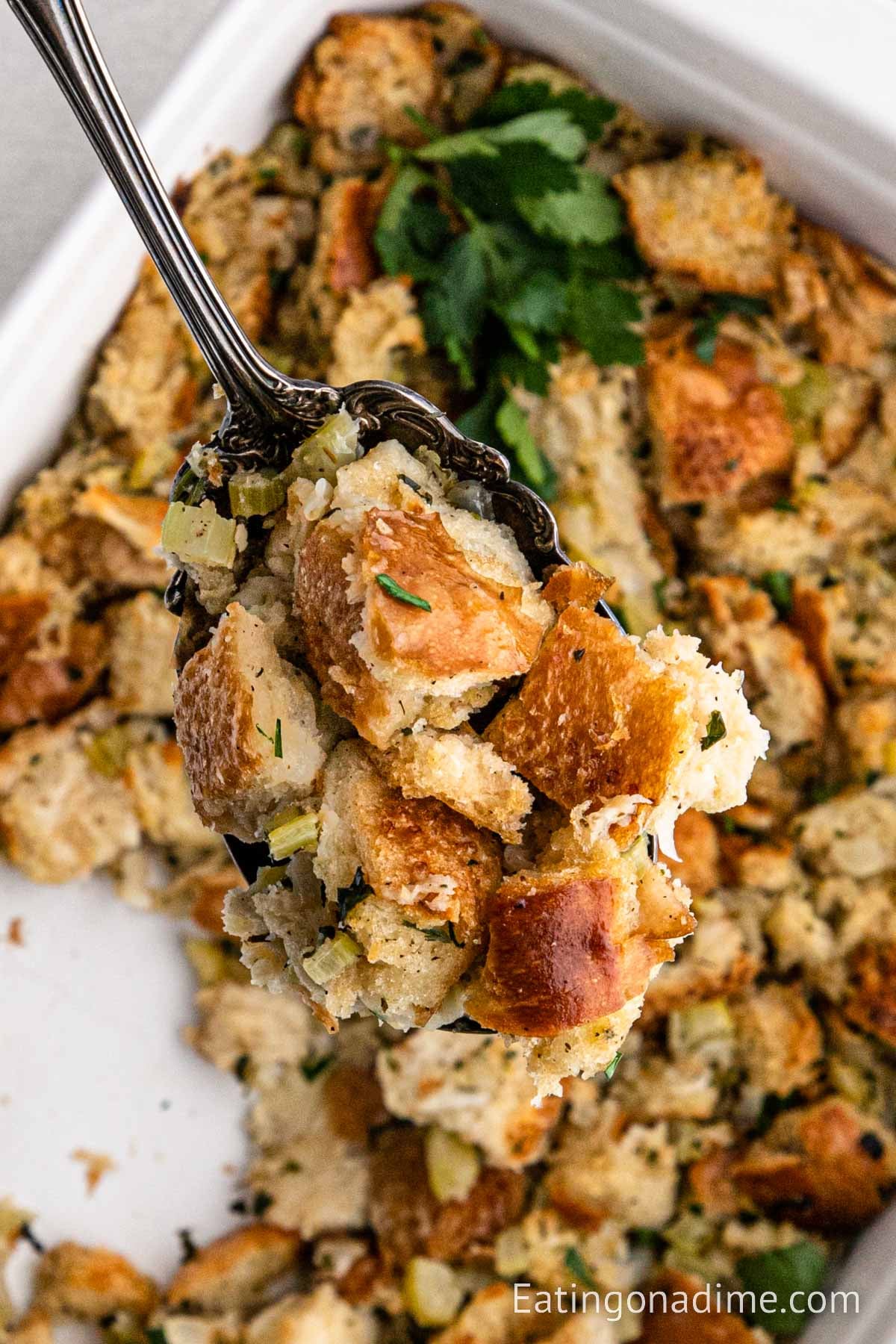 A serving of the stuffing on a spoon.