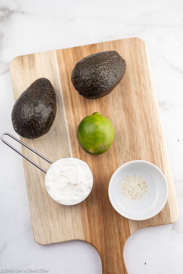 ingredients for recipe: avocados, lime, Greek yogurt, seasoning.