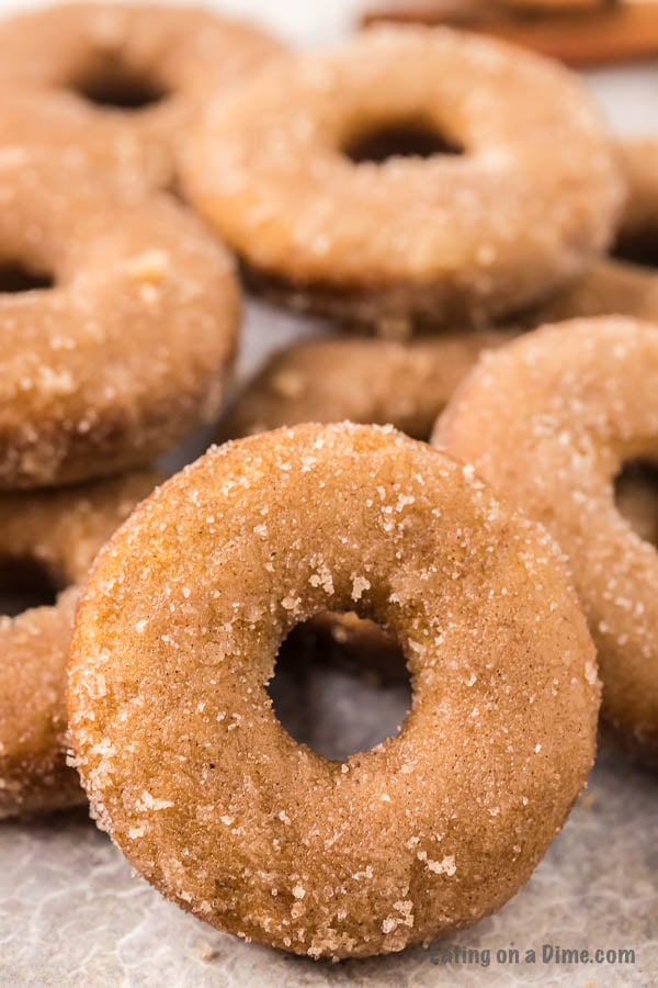 Apple Cider Baked Donuts stacked on top of each other 