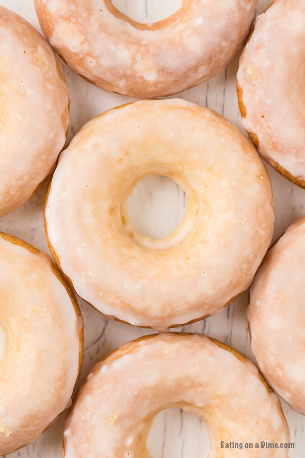 Close up image of glazed donuts. 