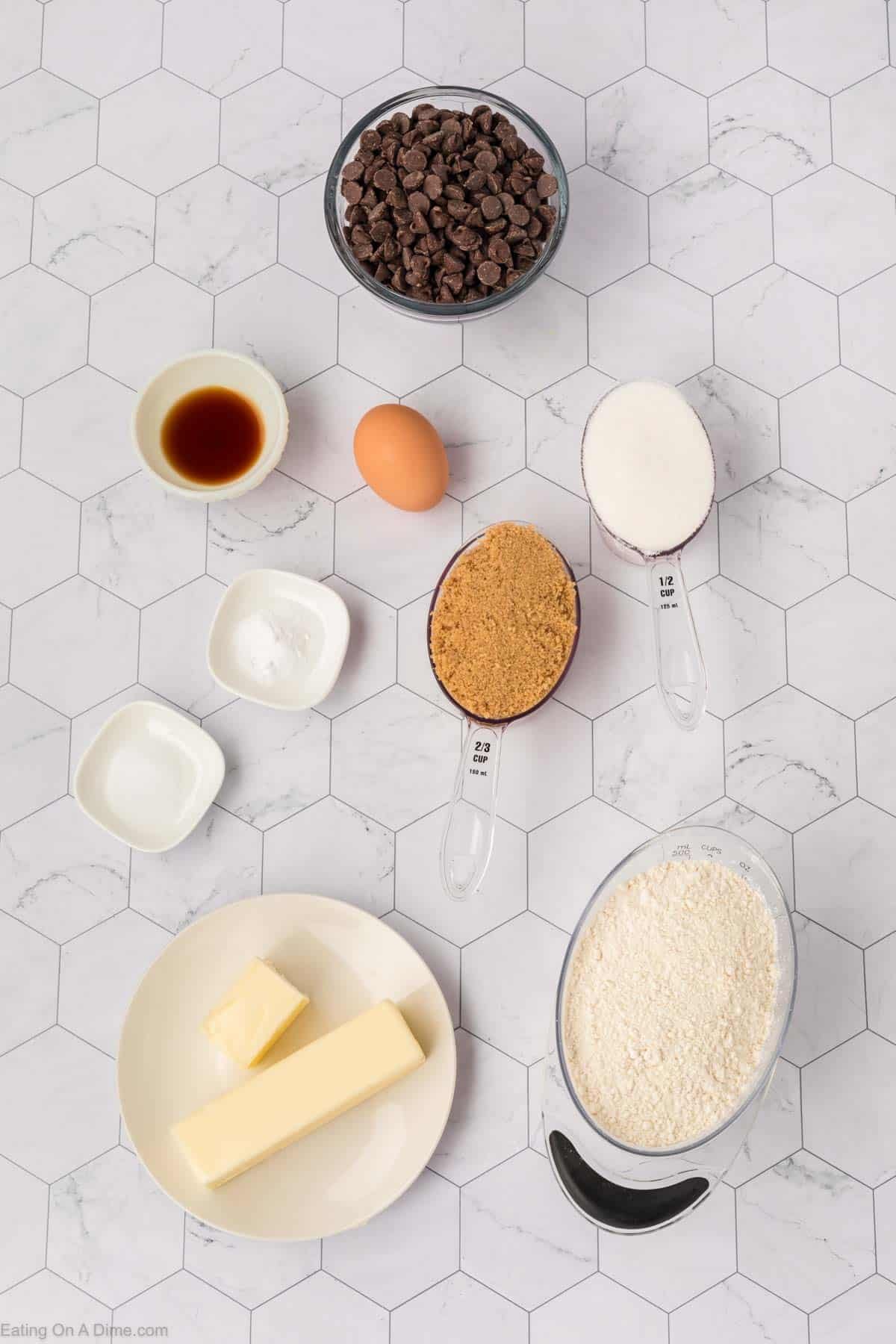 Ingredients - Flour, baking soda, salt, softened butter, sugar, brown sugar, egg, vanilla, chocolate chips, cream cheese