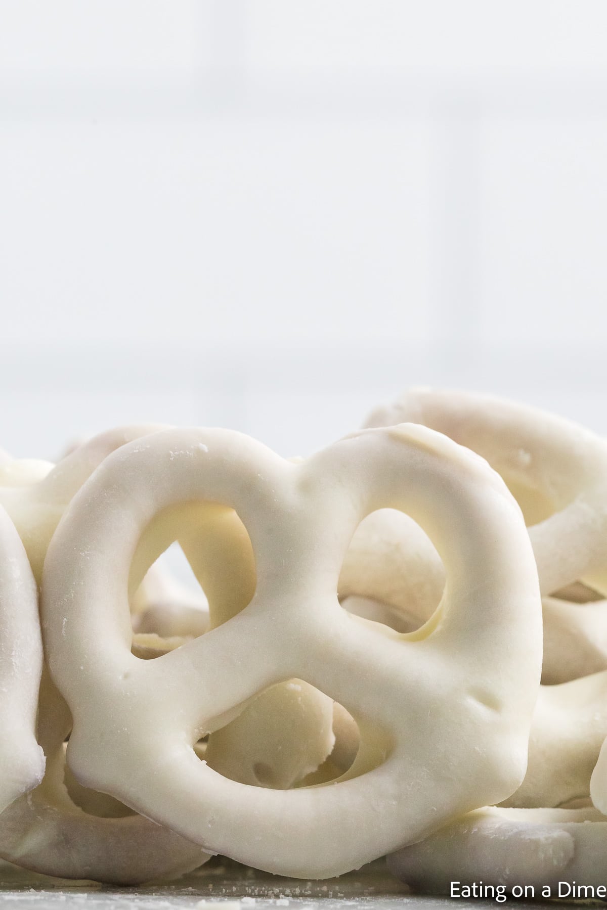Close up image of white chocolate covered pretzels