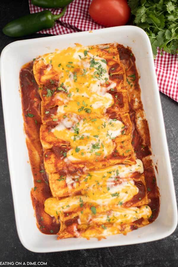 Casserole dish of cheese enchiladas ready to eat. 