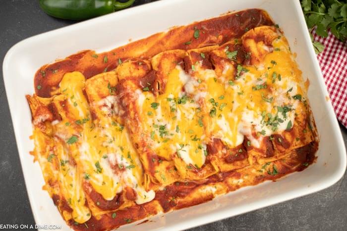 Casserole dish of cheese enchiladas ready to eat. 