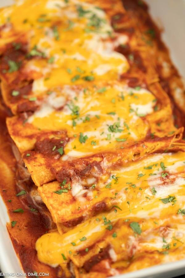 Casserole dish of cheese enchiladas ready to eat. 