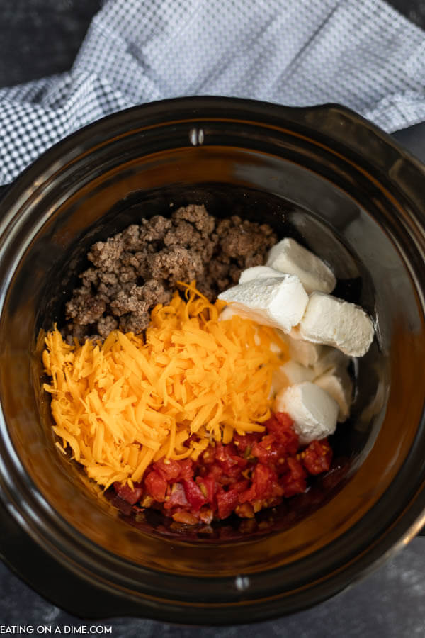 Crockpot with ingredients ready to cook.