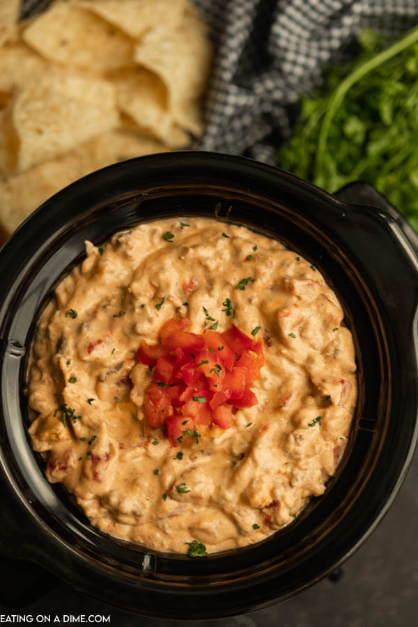 Crockpot of cheeseburger dip .